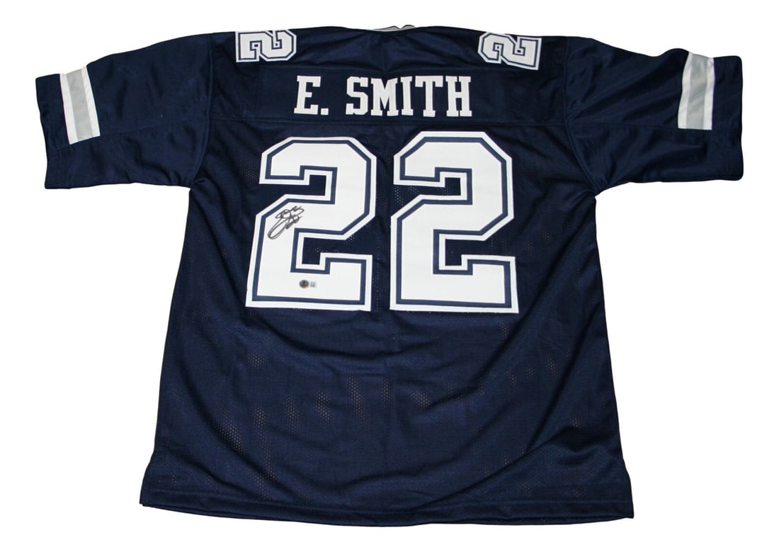 Emmitt Smith Signed Dallas Cowboys Jersey BAS Certified: Emmitt Smith Signed Dallas Cowboys Jersey BAS Certified This is an original Dallas Cowboys jersey autographed by the legendary Emmitt Smith, a celebrated player in football history. The jersey comes w