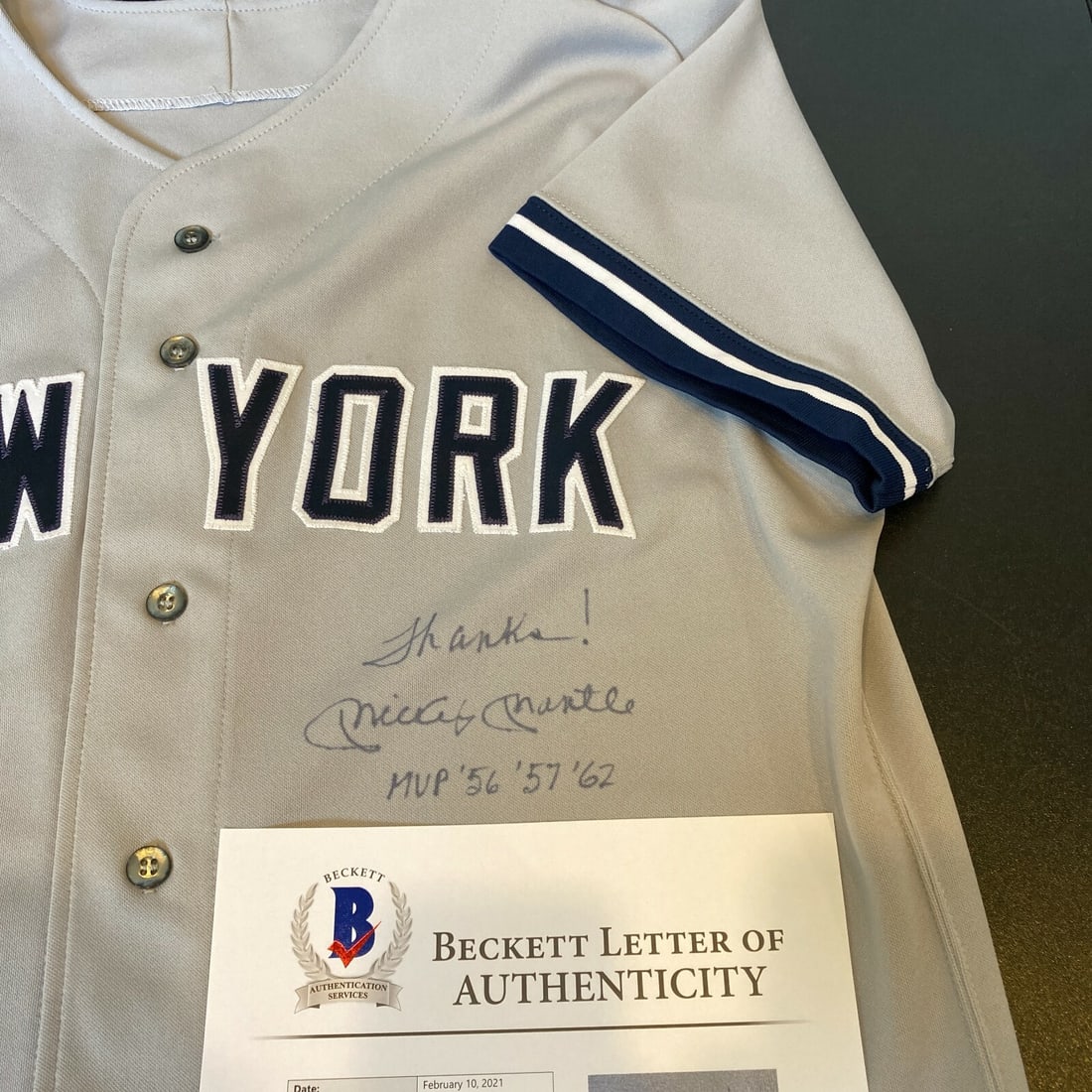 Mickey Mantle Inscribed MVP Years Signed Yankees Jersey With Beckett Authentication: Mickey Mantle Inscribed MVP Years Signed Yankees Jersey With Beckett Authentication This is a pre-owned New York Yankees jersey signed and inscribed by Mickey Mantle with "1956, 1957, 1962 MVP." The j