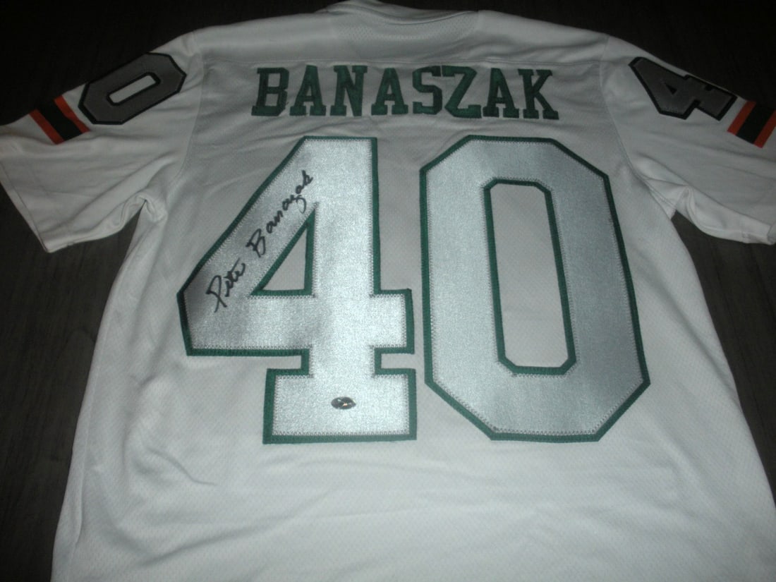 Pete Banaszak Miami Hurricanes Signed Adidas Jersey with Beckett COA: Pete Banaszak Miami Hurricanes Signed Adidas Jersey with Beckett COA This official licensed Adidas jersey features the signature of Pete Banaszak, a notable player associated with the Miami Hurricanes