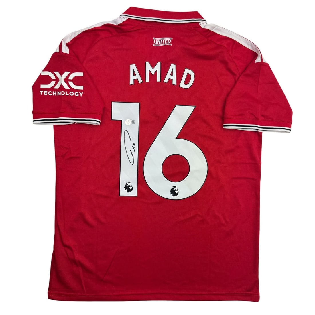 Manchester United Red Signed Jersey Amad Diallo Beckett COA: Manchester United Red Signed Jersey Amad Diallo Beckett COA Autographed Manchester United red soccer jersey signed by Amad Diallo. This original jersey is authenticated by Beckett Grading Services and