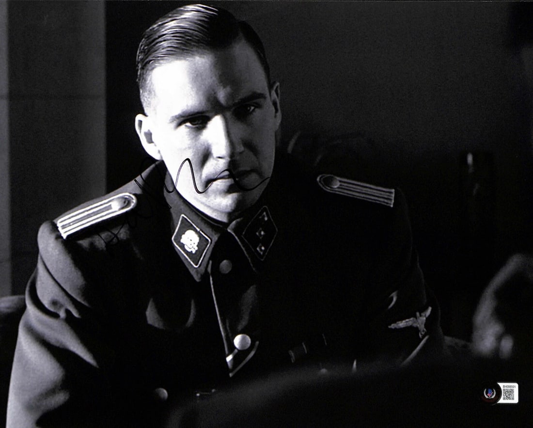 Ralph Fiennes Signed 11x14 Photo as Amon Goeth Schindlers List Beckett Authenticated: Ralph Fiennes Signed 11x14 Photo as Amon Goeth Schindlers List Beckett Authenticated This is an 11x14 photograph signed by Ralph Fiennes, who portrayed Amon Goeth in the film Schindler's List. The aut