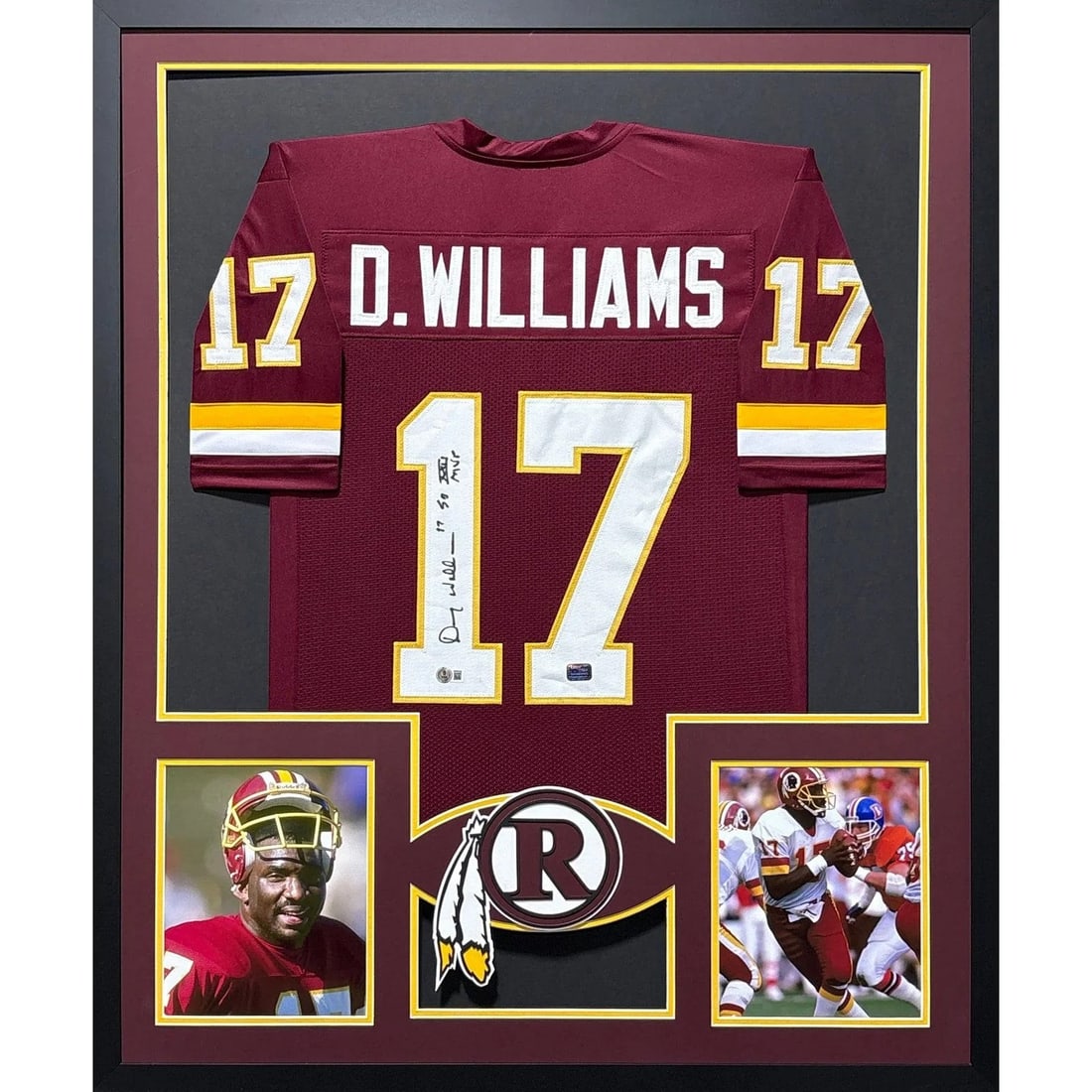 Beckett authenticated framed Doug Williams Washington Redskins jersey: Beckett authenticated framed Doug Williams Washington Redskins jersey Framed Washington Redskins jersey autographed by Doug Williams. This pre-owned piece features detailed framing with a team logo di
