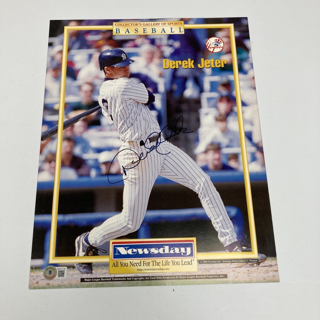 Derek Jeter Rookie Signed 11x14 Photo New York Yankees Beckett COA: Derek Jeter Rookie Signed 11x14 Photo New York Yankees Beckett COA This is an original 11x14 Newsday photo featuring Derek Jeter during his rookie season. The photo is signed by Jeter and comes with a