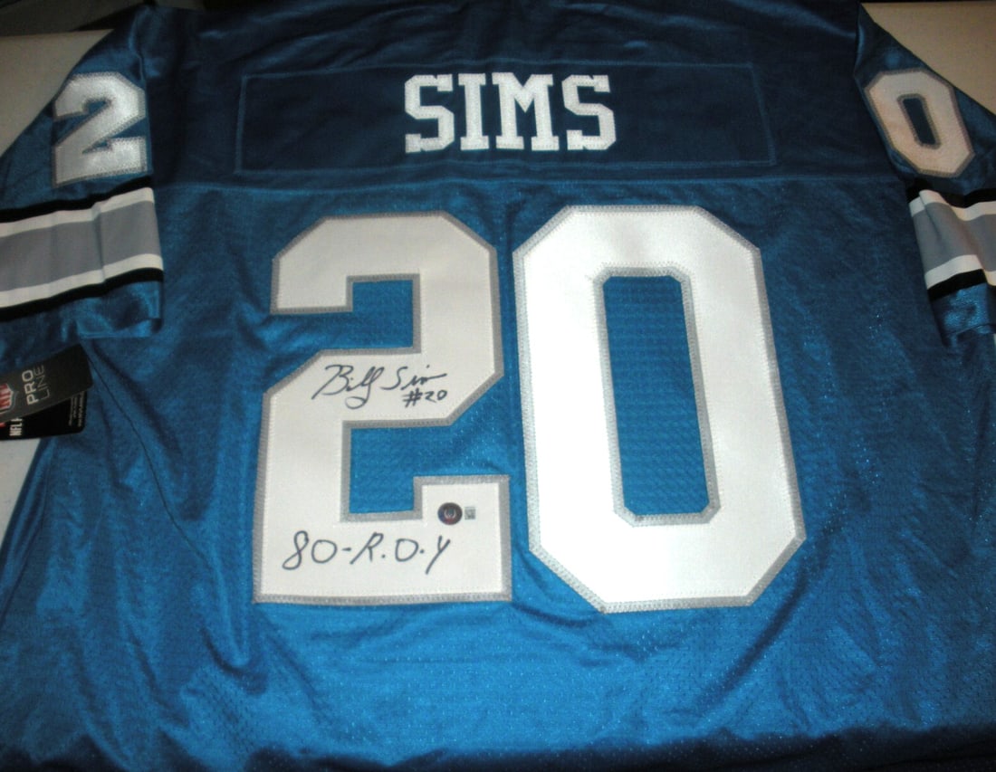 Billy Sims Detroit Lions Signed Proline Jersey with COA: Billy Sims Detroit Lions Signed Proline Jersey with COA This officially licensed ProLine jersey is signed by Billy Sims, a celebrated player of the Detroit Lions. It represents a significant piece of 