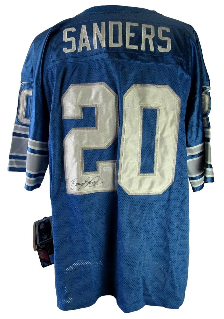 JSA Barry Sanders Autographed Detroit Lions Reebok Football Jersey 56: JSA Barry Sanders Autographed Detroit Lions Reebok Football Jersey 56 Original Barry Sanders signed Detroit Lions blue Reebok On Field football jersey. This pre-owned jersey is authenticated by JSA an
