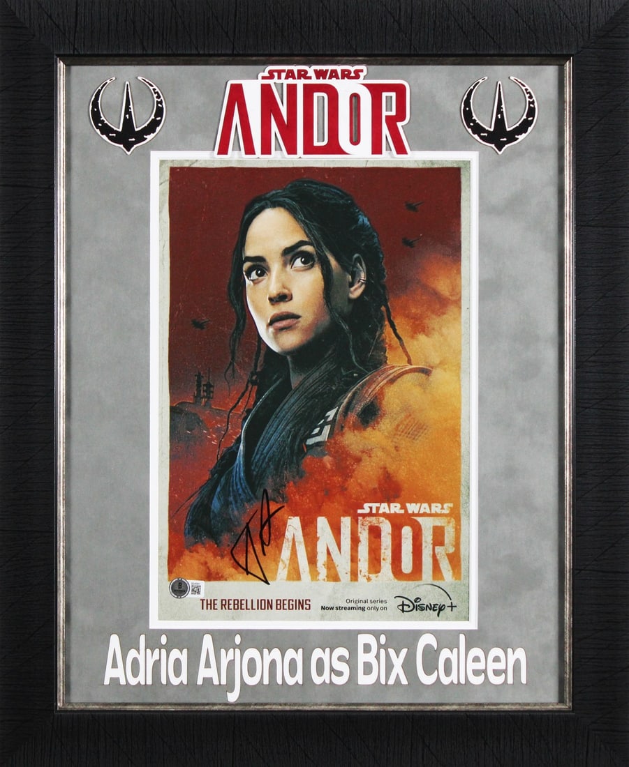 Adria Arjona Signed Star Wars Andor Framed Photo BAS Authentic: Adria Arjona Signed Star Wars Andor Framed Photo BAS Authentic Celebrate the iconic Star Wars universe with this authentic, framed photograph personally signed by Adria Arjona, known for her role in S