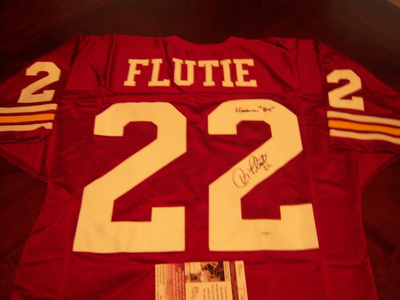 Doug Flutie signed Russell Boston College football jersey JSA COA: Doug Flutie signed Russell Boston College football jersey JSA COA This official licensed Russell jersey features the signature of Doug Flutie, commemorating his time at Boston College. The jersey is a