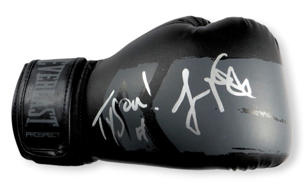 Boxing Glove Signed by Jamie Foxx with Tyson Inscription Beckett Authenticated: Boxing Glove Signed by Jamie Foxx with Tyson Inscription Beckett Authenticated This is a boxing glove personally signed and inscribed with "Tyson" by Jamie Foxx. The autograph has been authenticated b