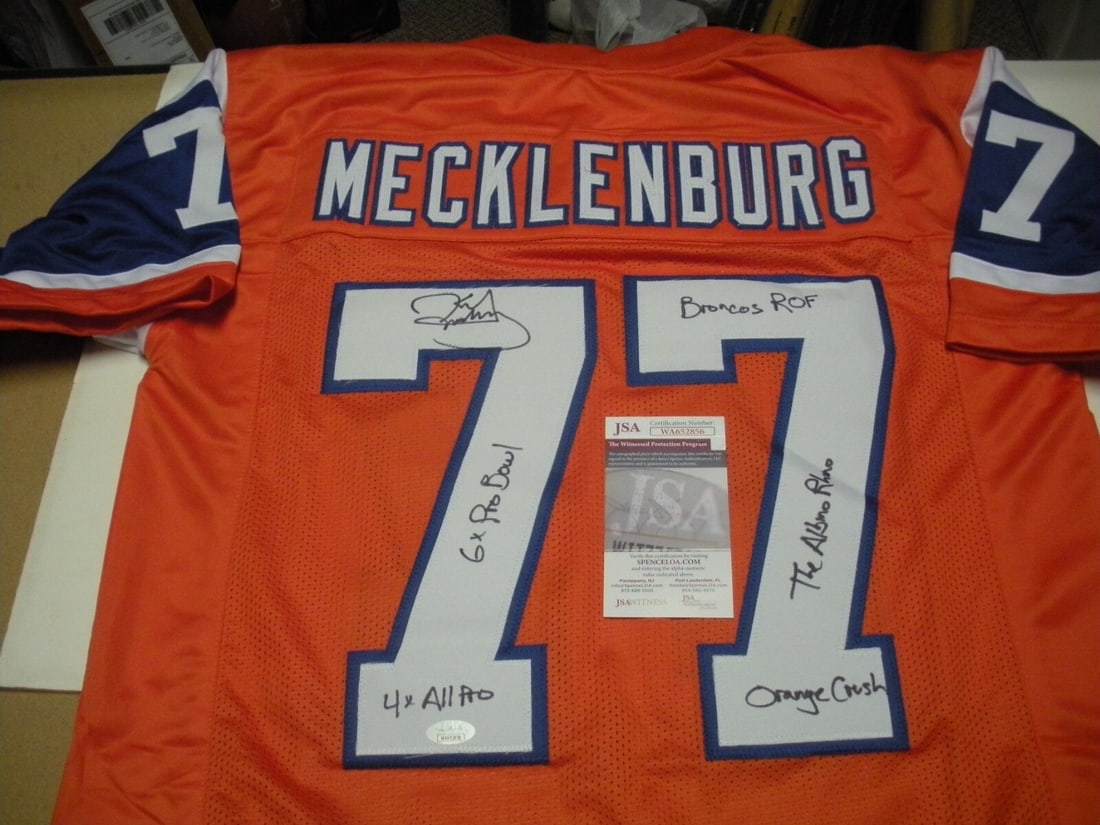 Signed Karl Mecklenburg Jersey with JSA COA and Denver Broncos Honors: Signed Karl Mecklenburg Jersey with JSA COA and Denver Broncos Honors This is a pre-owned Denver Broncos jersey signed by Karl Mecklenberg, a Ring of Honor member and six-time Pro Bowler. The jersey c