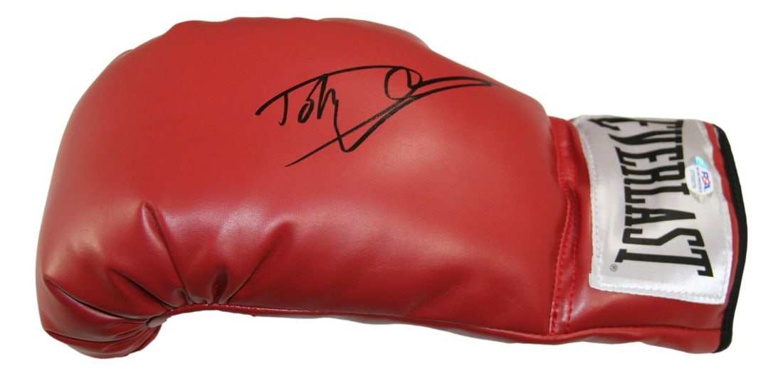 Boxing Glove Autographed by Dolph Lundgren as Ivan Drago PSA/DNA Certified: Boxing Glove Autographed by Dolph Lundgren as Ivan Drago PSA/DNA Certified This boxing glove is signed by Dolph Lundgren, who played Captain Ivan Drago in Rocky IV. The autograph is authenticated by P