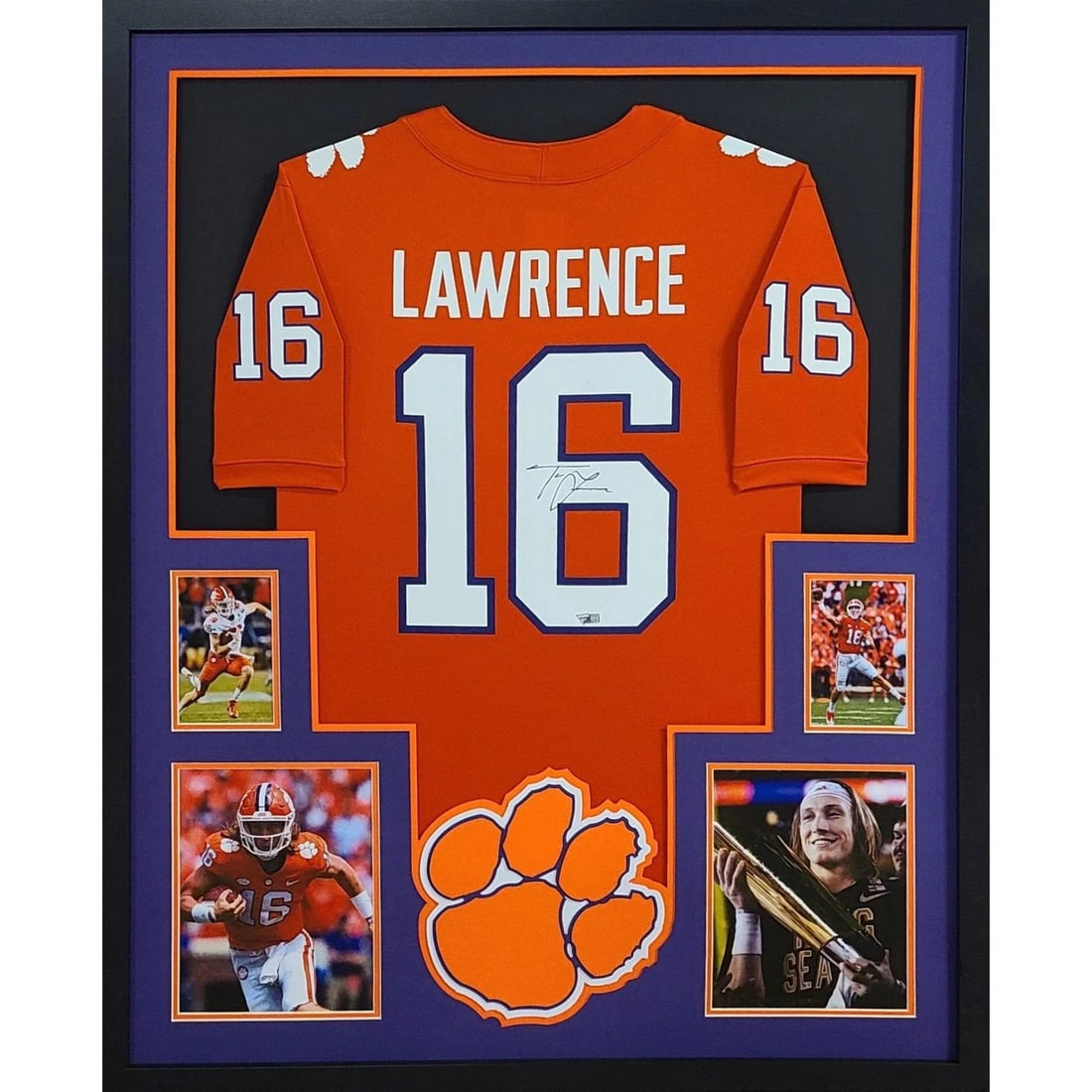Trevor Lawrence Autographed Framed Jersey by Fanatics: Trevor Lawrence Autographed Framed Jersey by Fanatics Celebrate the legacy of Trevor Lawrence with this expertly framed autographed jersey from Clemson. This jersey is authenticated by Fanatics, a rep