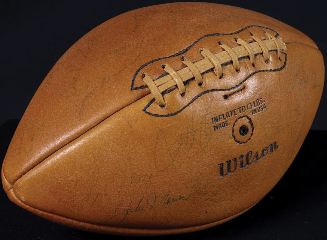 1964 Cleveland Browns Team Signed Football with Jim Brown JSA COA: 1964 Cleveland Browns Team Signed Football with Jim Brown JSA COA Presenting a remarkable piece of NFL history, this vintage Wilson football is inscribed "1964 N.F.L. WORLD CHAMPIONS - CLEV. BROWNS" a