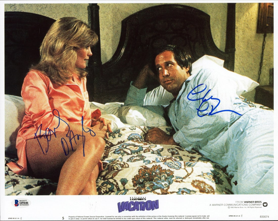 Chevy Chase Beverly D'Angelo Signed 11x14 National Lampoon's Vacation Photo BAS: Chevy Chase Beverly D'Angelo Signed 11x14 National Lampoon's Vacation Photo BAS This stunning 11x14 lobby card photo from the iconic film 'National Lampoon's Vacation' features the authentic signature