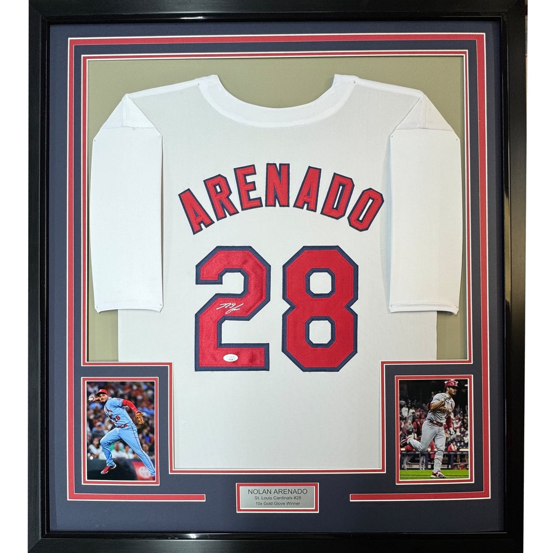 Nolan Arenado Autographed Framed St. Louis Cardinals White Jersey JSA 35x39: Nolan Arenado Autographed Framed St. Louis Cardinals White Jersey JSA 35x39 Professionally framed and matted signed Nolan Arenado St. Louis Cardinals white jersey display with two 5x7 photos. This ori