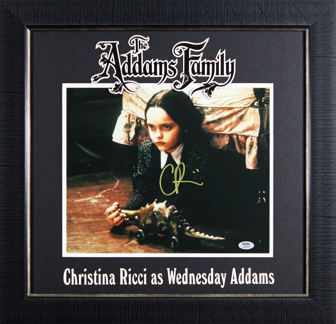 Framed 11x14 Christina Ricci autographed Addams Family photo PSA DNA AQ16852: Framed 11x14 Christina Ricci autographed Addams Family photo PSA DNA AQ16852 Framed 11x14 original photograph from The Addams Family, personally signed by Christina Ricci. The piece is professionally 