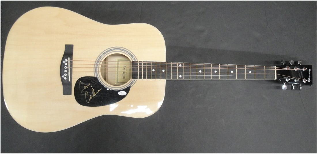 Authentic Carlene Carter Signed Guitar With JSA Authentication: Authentic Carlene Carter Signed Guitar With JSA Authentication This is an original guitar autographed by Carlene Carter, the renowned rock star. The signature has been authenticated by James Spence Au