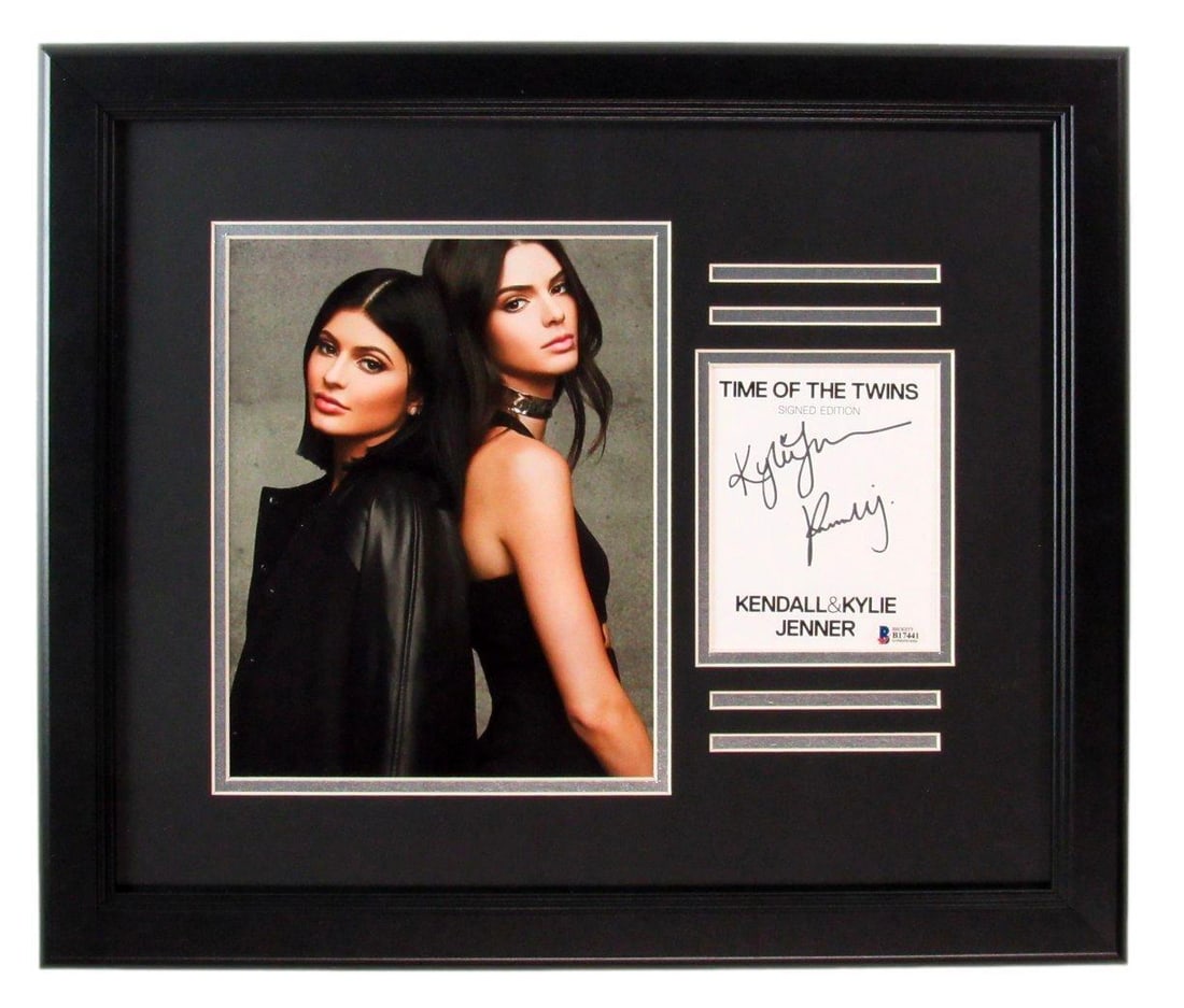 Kendall & Kylie Jenner Autographed Cut Card with Photo Framed Beckett Certified: Kendall & Kylie Jenner Autographed Cut Card with Photo Framed Beckett Certified This item features an autographed cut card by Kendall and Kylie Jenner, accompanied by an 8x10 photo, all beautifully fr