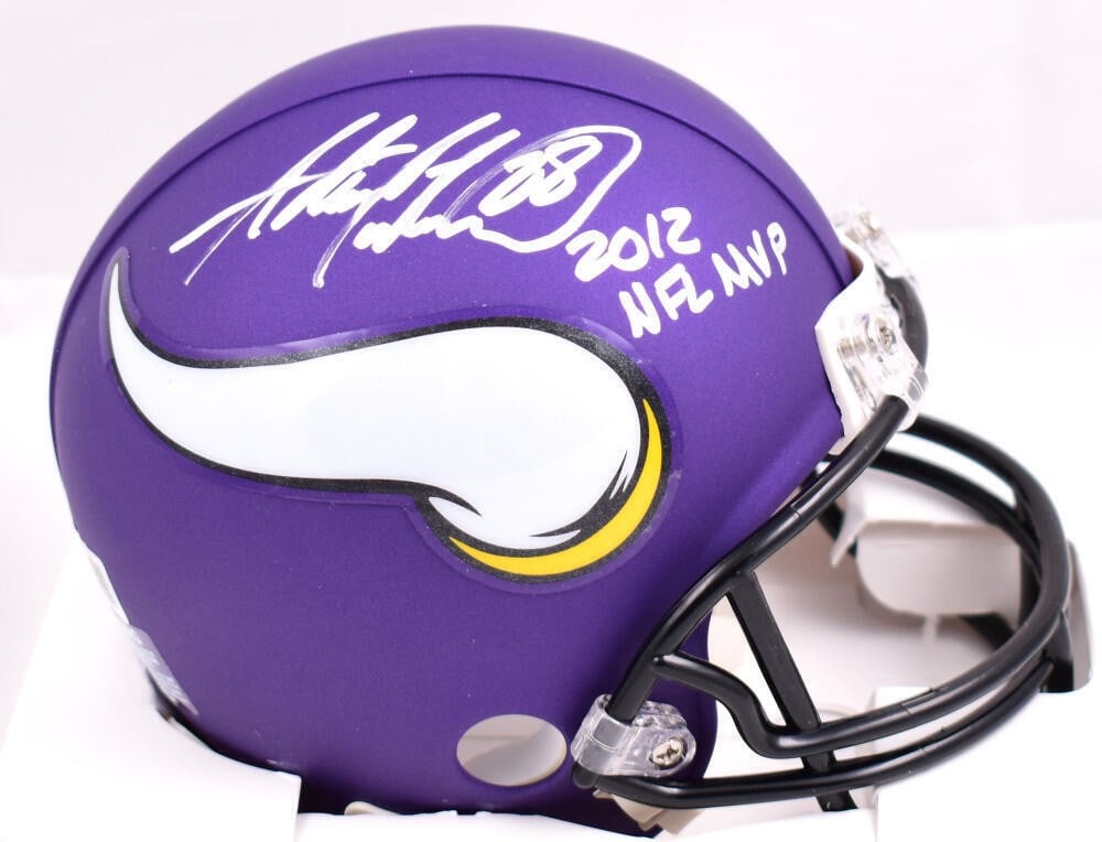 Minnesota Vikings Mini Helmet Signed by Adrian Peterson MVP Beckett Holo: Minnesota Vikings Mini Helmet Signed by Adrian Peterson MVP Beckett Holo Autographed Minnesota Vikings mini helmet signed by Adrian Peterson. The item is an original football collectible from the Unit