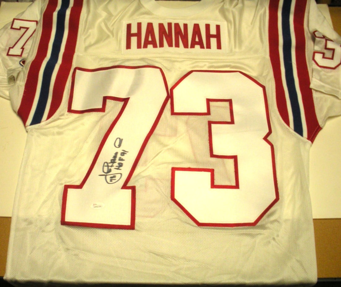 Signed John Hannah Patriots Champion jersey JSA COA: Signed John Hannah Patriots Champion jersey JSA COA This is an official licensed Champion jersey signed by John Hannah of the New England Patriots. The jersey is authenticated by JSA/COA and is a genu