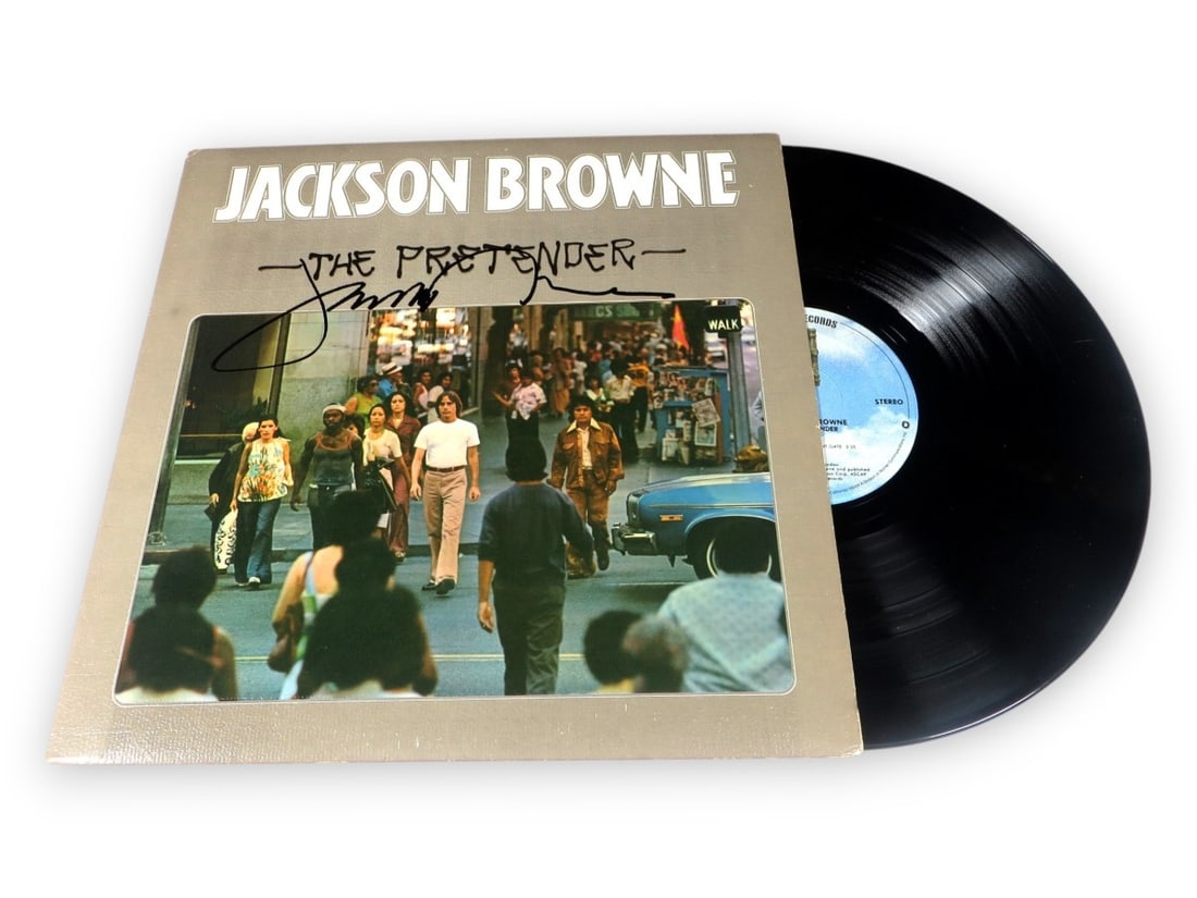 Jackson Browne Signed Album Cover The Pretender JSA Authenticated: Jackson Browne Signed Album Cover The Pretender JSA Authenticated This is an original autographed record album cover of Jackson Browne's 'The Pretender'. The album cover features the signature of the 