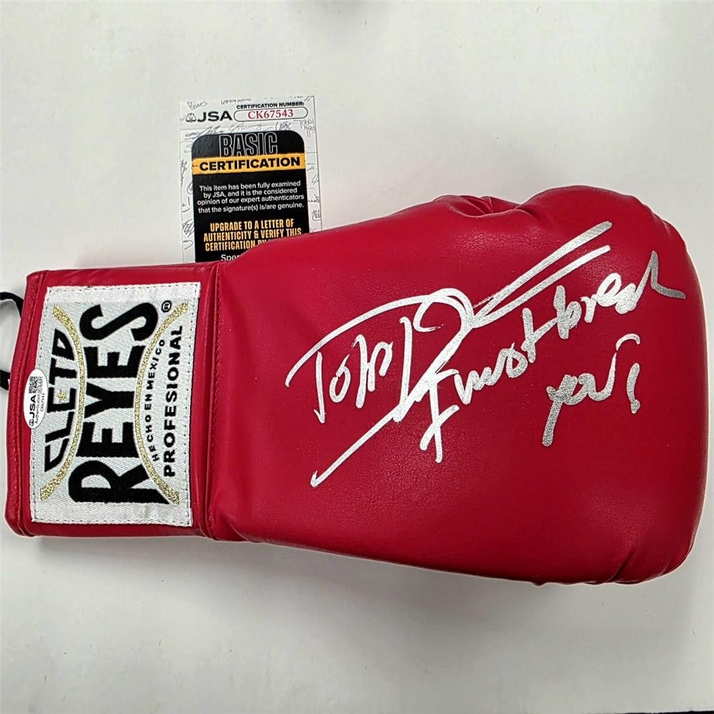 Dolph Lundgren Autographed Drago Boxing Glove JSA Authenticated Rocky IV: Dolph Lundgren Autographed Drago Boxing Glove JSA Authenticated Rocky IV This Drago boxing glove features the autograph of Dolph Lundgren, known for his role in Rocky IV. The signature has been authen