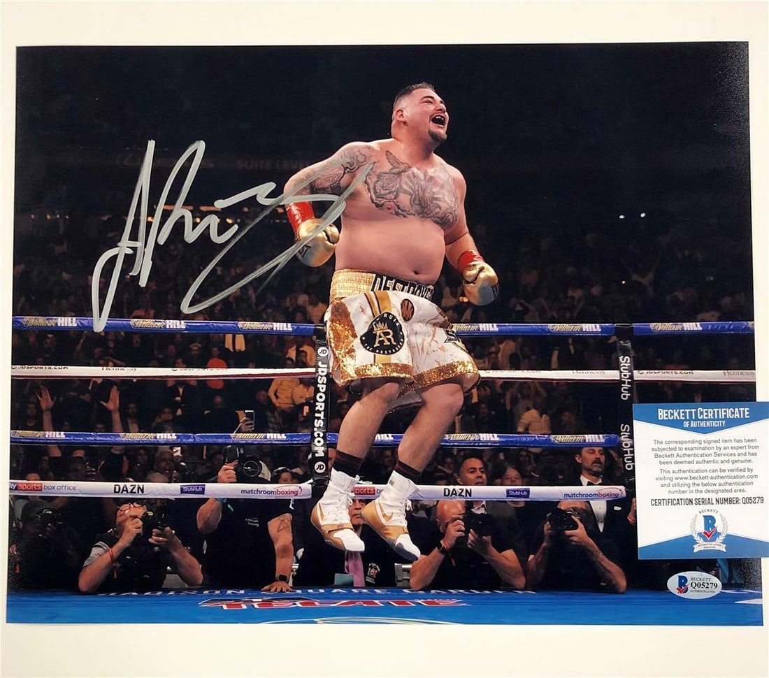 Signed 11x14 Boxing Photo Andy Ruiz Jr Beckett Authenticated: Signed 11x14 Boxing Photo Andy Ruiz Jr Beckett Authenticated This 11x14 photograph captures Andy Ruiz Jr in action against Anthony Joshua and features Ruiz Jr's autograph. The authenticity of the sign