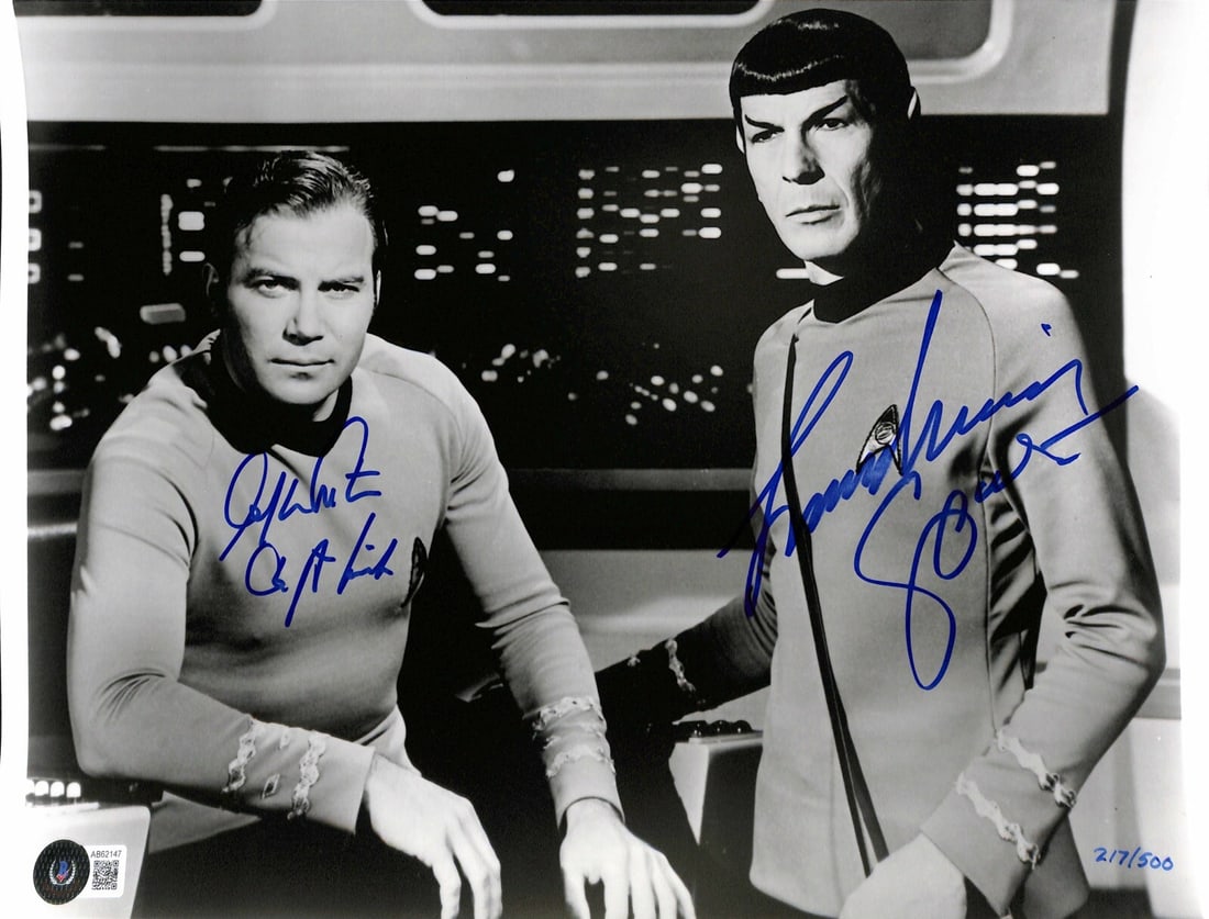 11x14 Photo Signed by William Shatner and Leonard Nimoy Beckett Authenticated: 11x14 Photo Signed by William Shatner and Leonard Nimoy Beckett Authenticated This is an original 11x14 matte photograph featuring signatures from William Shatner and Leonard Nimoy, who portrayed "Cap