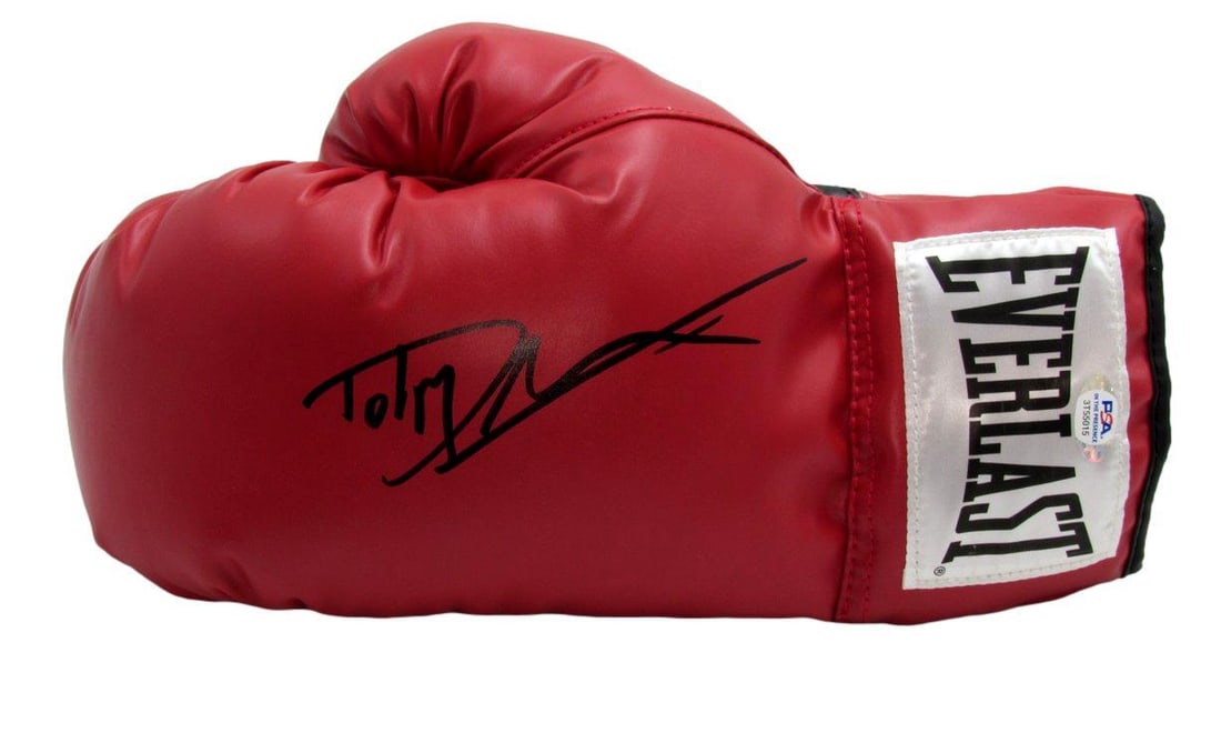 Dolph Lundgren Signed Ivan Drago Boxing Glove PSA/DNA Authentic: Dolph Lundgren Signed Ivan Drago Boxing Glove PSA/DNA Authentic This offering features an original Dolph Lundgren autographed Everlast red left boxing glove, famously portrayed as Ivan Drago in the Ro