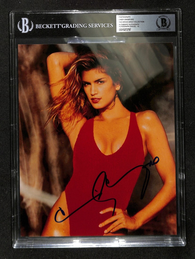 Cindy Crawford Signed 8x10 Photo Beckett Grade 10 Authentic: Cindy Crawford Signed 8x10 Photo Beckett Grade 10 Authentic This stunning autographed 8x10 color photograph features the iconic Cindy Crawford, signed in blue permanent marker. The signature has been 