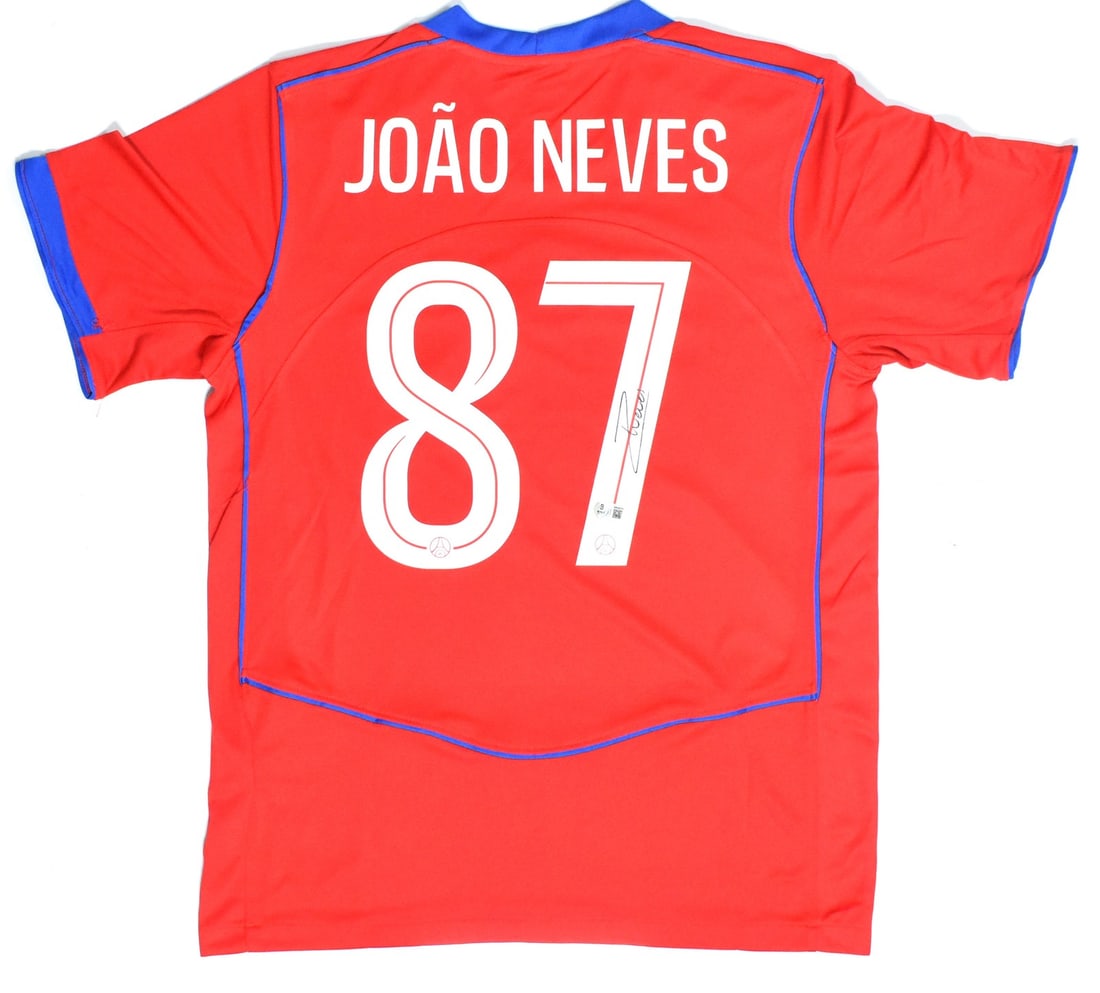 PSG red third jersey autographed by Joao Neves Beckett hologram #87: PSG red third jersey autographed by Joao Neves Beckett hologram #87 This is a pre-owned PSG red third soccer jersey, autographed by Joao Neves and featuring his number 87. The jersey is an original it