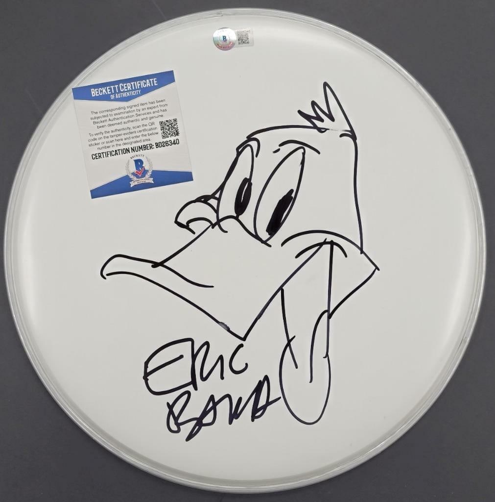 12 Inch Drumhead Signed by Eric Bauza with Daffy Duck Sketch Beckett Authenticated: 12 Inch Drumhead Signed by Eric Bauza with Daffy Duck Sketch Beckett Authenticated This 12-inch drumhead is signed by Eric Bauza, the voice of Daffy Duck, and features a sketch. The autograph is authe