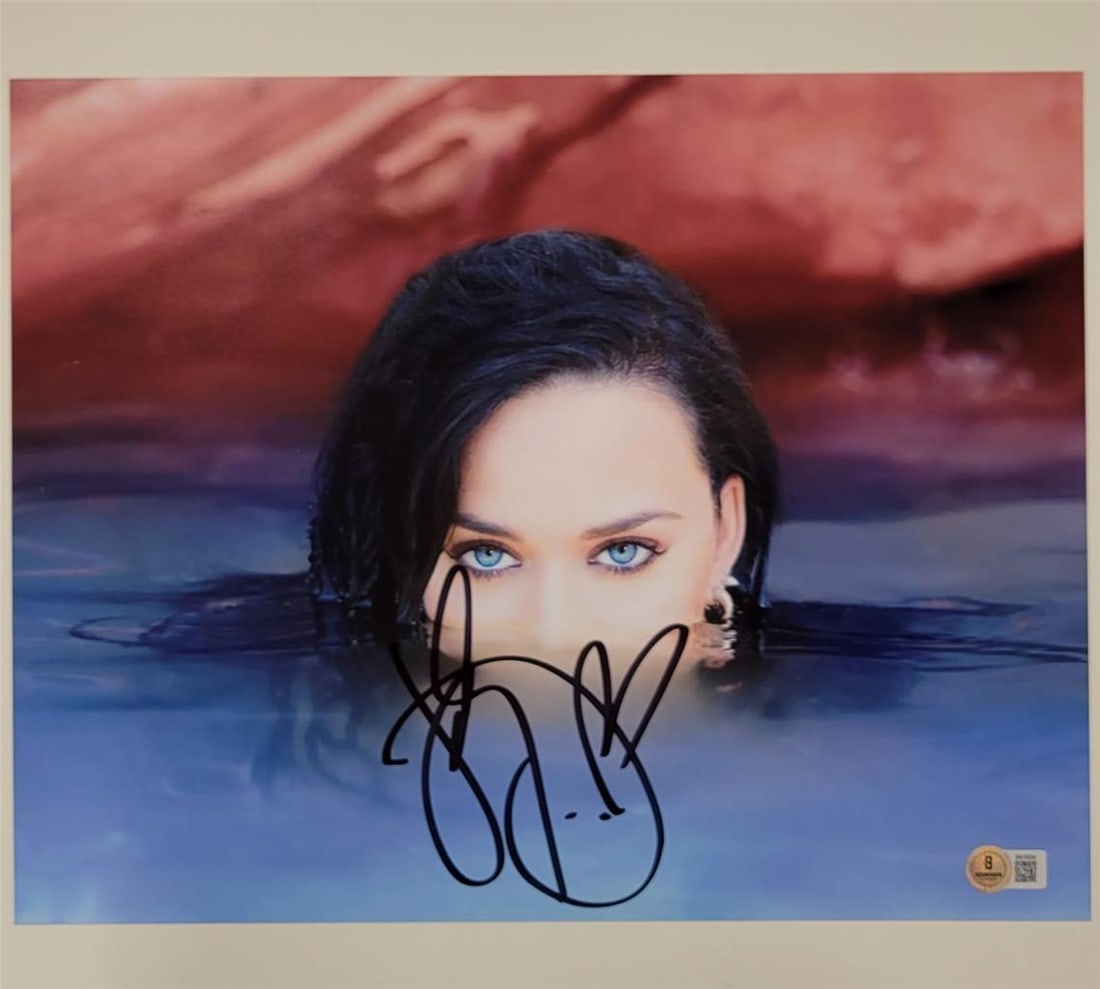 Katy Perry autographed 11x14 photograph with Beckett authentication: Katy Perry autographed 11x14 photograph with Beckett authentication This is an original 11x14 photograph signed by Katy Perry, featuring her autograph authenticated by Beckett Authentication Services.