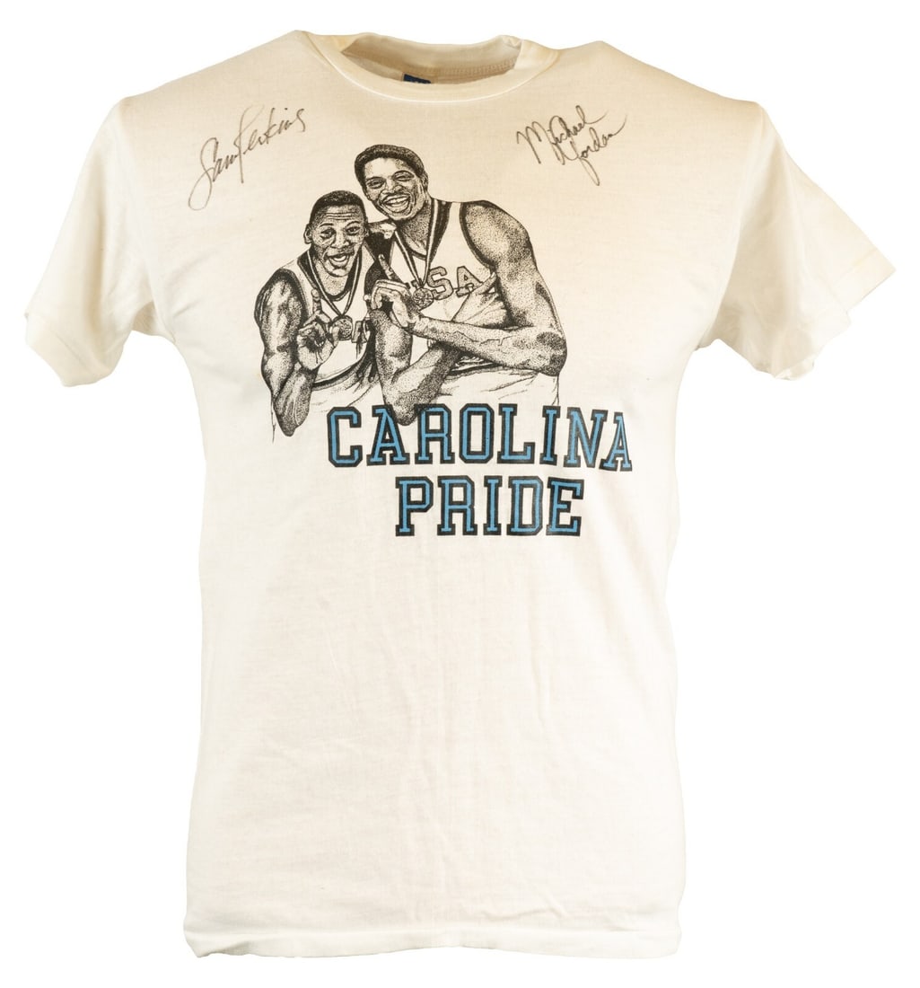 Michael Jordan Sam Perkins Signed UNC T-Shirt JSA Authenticated: Michael Jordan Sam Perkins Signed UNC T-Shirt JSA Authenticated Celebrate basketball history with this authentic University of North Carolina t-shirt, signed by legends Michael Jordan and Sam Perkins.