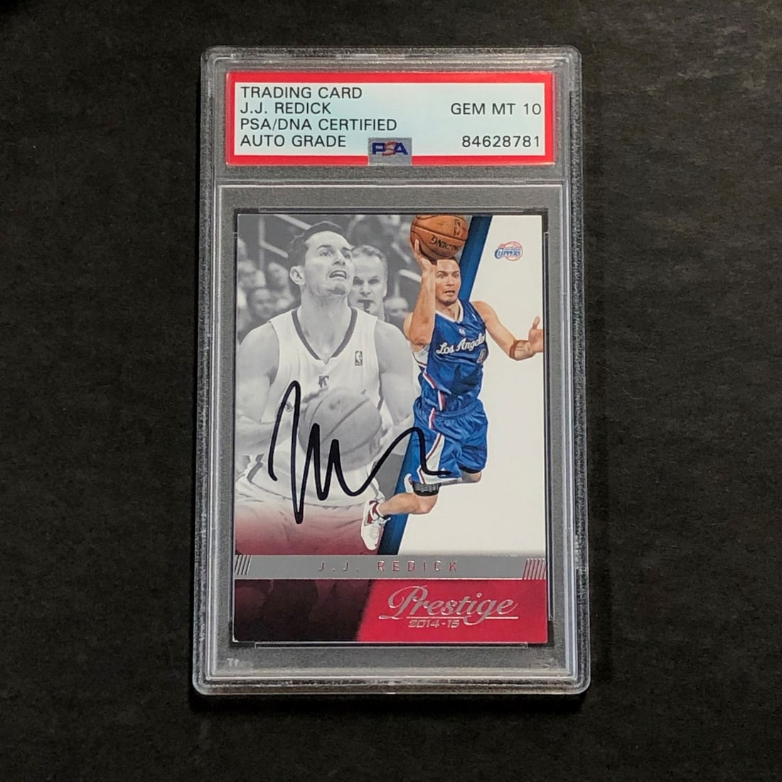 PSA slabbed J.J. Redick autographed 2014-15 Prestige #150 card: PSA slabbed J.J. Redick autographed 2014-15 Prestige #150 card This is an original 2014-15 Panini Prestige #150 basketball trading card featuring J.J. Redick, who played for the Los Angeles Clippers. 