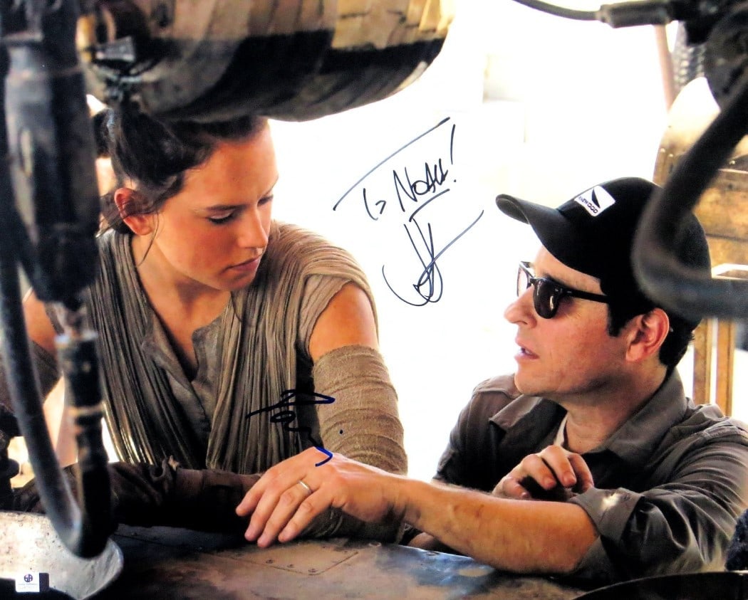 Daisy Ridley J.J. Abrams Signed 16x20 Star Wars Photo Authenticated: Daisy Ridley J.J. Abrams Signed 16x20 Star Wars Photo Authenticated This stunning 16X20 photograph features the autographs of Daisy Ridley and JJ Abrams, capturing a memorable moment from Star Wars: T