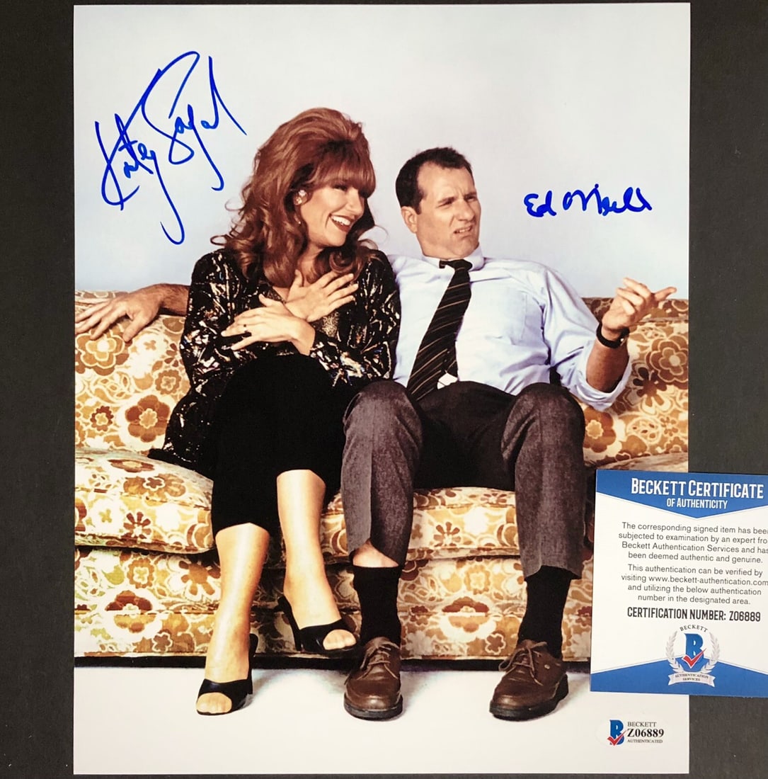 Ed O'Neill Katey Sagal Dual Signed Married With Children 8x10 Photo Beckett COA: Ed O'Neill Katey Sagal Dual Signed Married With Children 8x10 Photo Beckett COA This is an original 8x10 photo from the iconic TV show "Married With Children," featuring dual signatures from stars Ed 