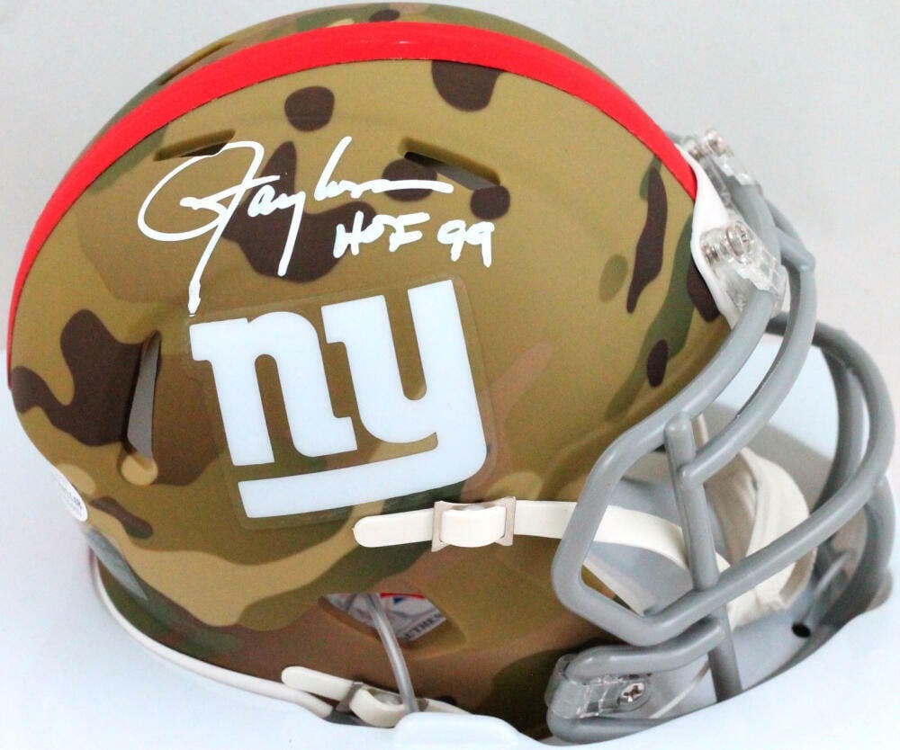 Lawrence Taylor signed Giants camo mini helmet Beckett HOF: Lawrence Taylor signed Giants camo mini helmet Beckett HOF This pre-owned New York Giants camo mini helmet features the autograph of legendary football player Lawrence Taylor, including his Hall of Fa