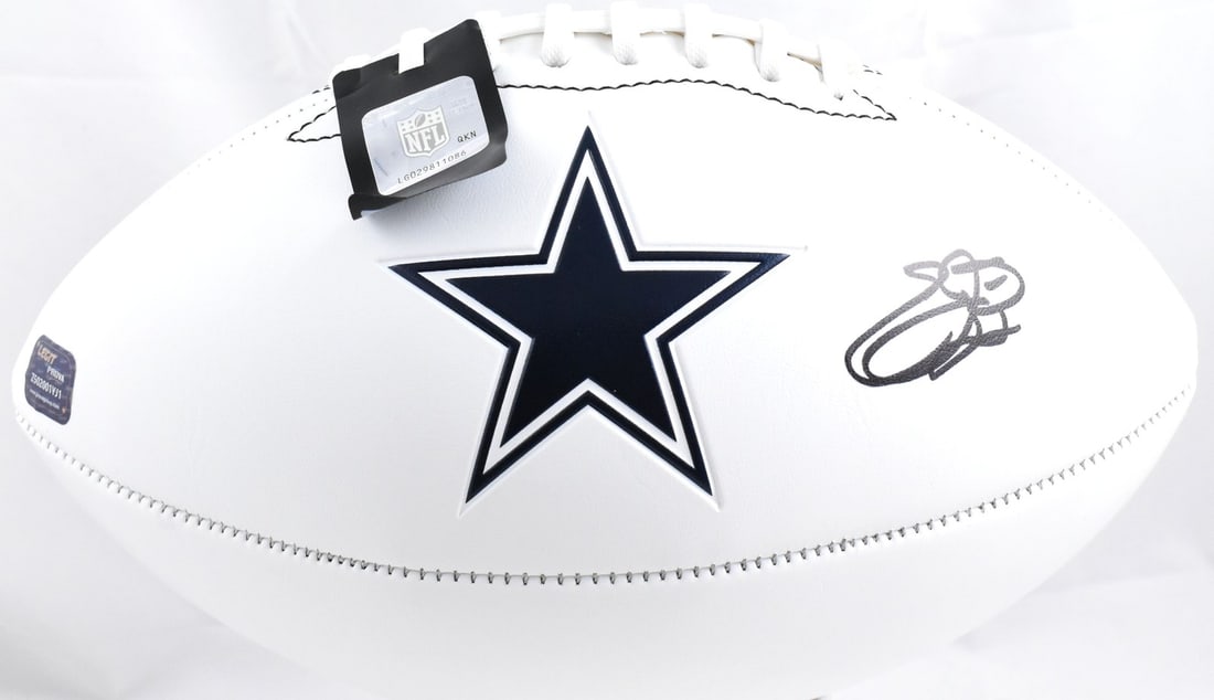 Dallas Cowboys Football Signed by Emmitt Smith with Beckett Witness Hologram: Dallas Cowboys Football Signed by Emmitt Smith with Beckett Witness Hologram This Dallas Cowboys logo football is autographed by Emmitt Smith. The ball features a Beckett W hologram for added authenti
