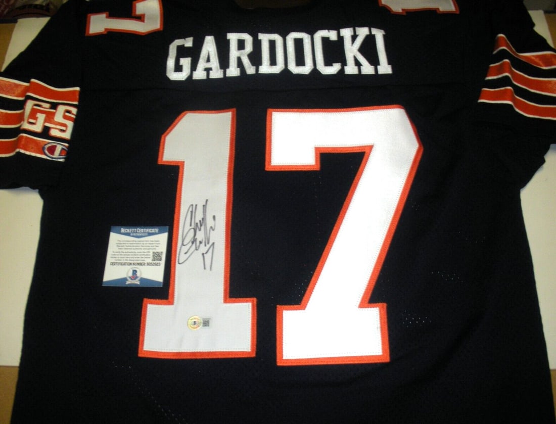 Chris Gardocki Signed Chicago Bears Jersey Beckett Certified: Chris Gardocki Signed Chicago Bears Jersey Beckett Certified This official licensed Chicago Bears Champion jersey is a unique collectible for any football fan. Authentically signed by Chris Gardocki, 
