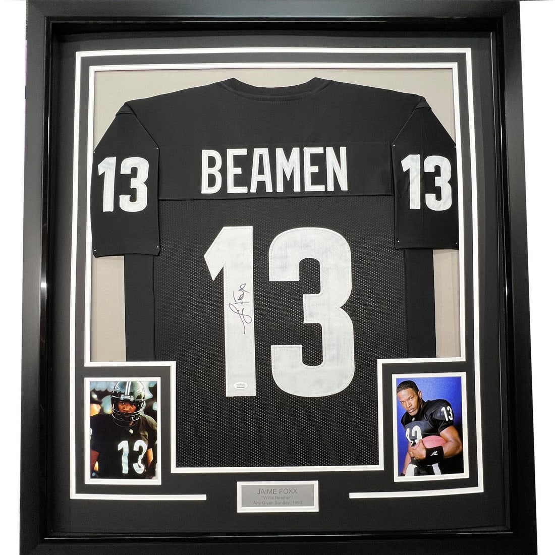Jamie Foxx Signed Miami Sharks Framed Football Jersey JSA 35x39: Jamie Foxx Signed Miami Sharks Framed Football Jersey JSA 35x39 Professionally framed and matted black Willie Beamen jersey signed by Jamie Foxx. This football collectible includes two 5x7 photos and 