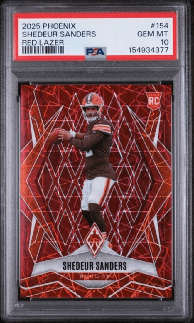 PSA 10 Shedeur Sanders 2025 Panini Phoenix Red Lazer 154 199: PSA 10 Shedeur Sanders 2025 Panini Phoenix Red Lazer 154 199 Graded 2025 Panini Phoenix Shedeur Sanders #154 Red Lazer rookie card, professionally encapsulated by PSA and assigned a Gem Mint 10 grade.
