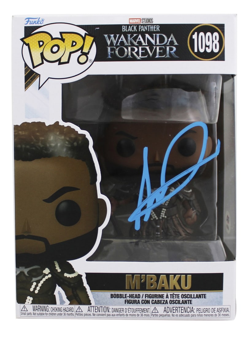 PSA Winston Duke autographed M'Baku 1098 Funko Pop figure: PSA Winston Duke autographed M'Baku 1098 Funko Pop figure Autographed M'Baku #1098 Funko Pop vinyl figure from Black Panther, personally signed by Winston Duke. This original collectible is PSA/DNA au