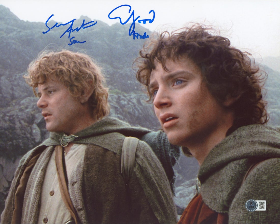 11x14 Lord of the Rings photo signed by Elijah Wood Sean Astin BAS: 11x14 Lord of the Rings photo signed by Elijah Wood Sean Astin BAS Original 11x14 horizontal Ridge photograph from Lord of the Rings, personally signed by Elijah Wood and Sean Astin with the inscripti