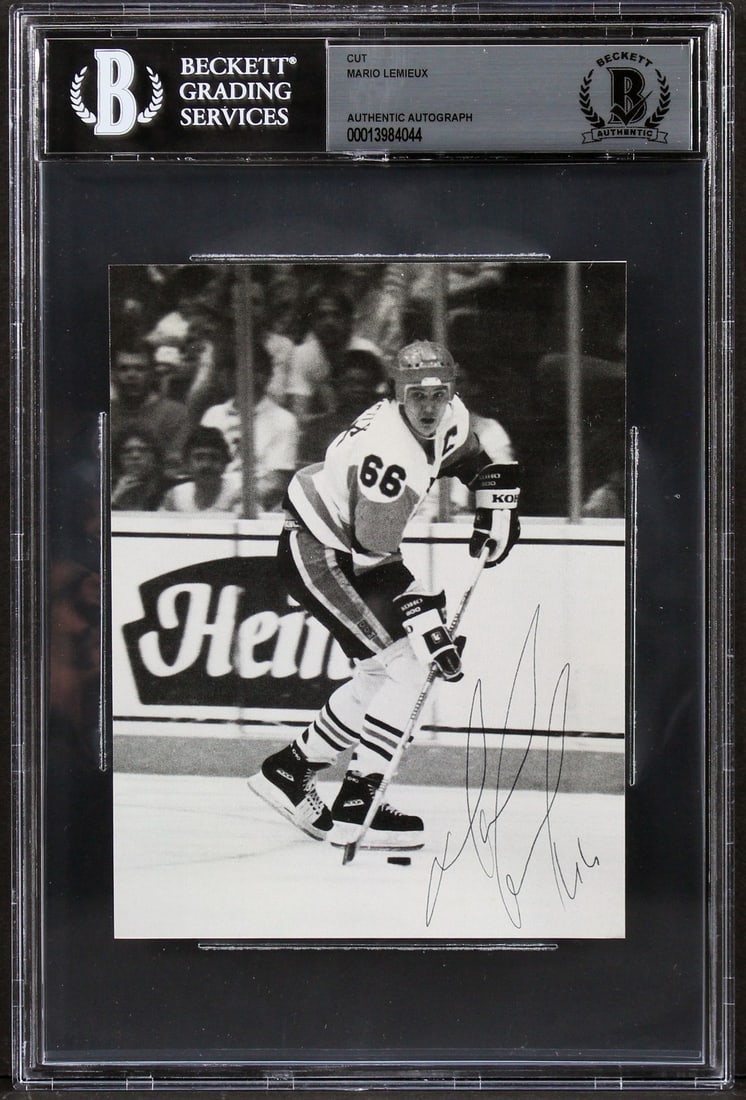 Mario Lemieux signed 4.25x5.5 cut Pittsburgh Penguins BAS slabbed: Mario Lemieux signed 4.25x5.5 cut Pittsburgh Penguins BAS slabbed This 4.25 x 5.5 inch cut signature features an authentic autograph by Mario Lemieux of the Pittsburgh Penguins. The item is slabbed an