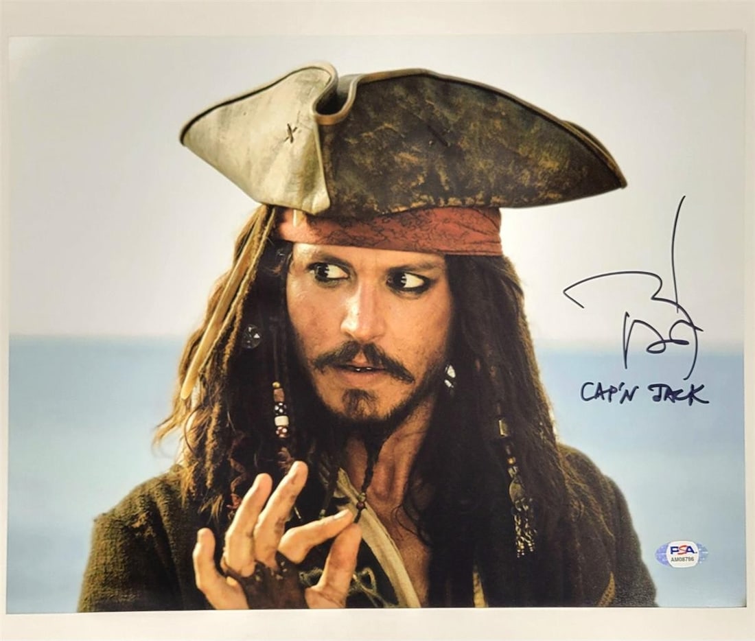 Johnny Depp autographed Pirates of the Caribbean photograph PSA 10: Johnny Depp autographed Pirates of the Caribbean photograph PSA 10 This original photograph from Pirates of the Caribbean features a signature by Johnny Depp as Captain Jack. The autograph has been au