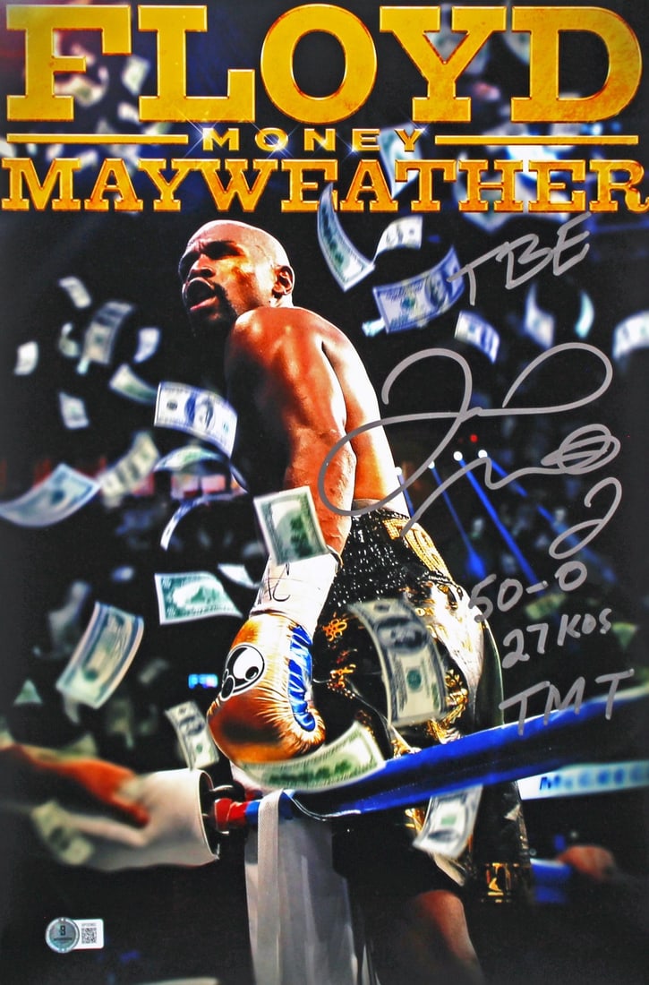 Floyd Mayweather Signed 12x18 Boxing Photo Beckett Authenticated with Inscription: Floyd Mayweather Signed 12x18 Boxing Photo Beckett Authenticated with Inscription This 12x18 photo features Floyd Mayweather and is personally signed with the inscription "50-0 27 KOs TMT." The autogr