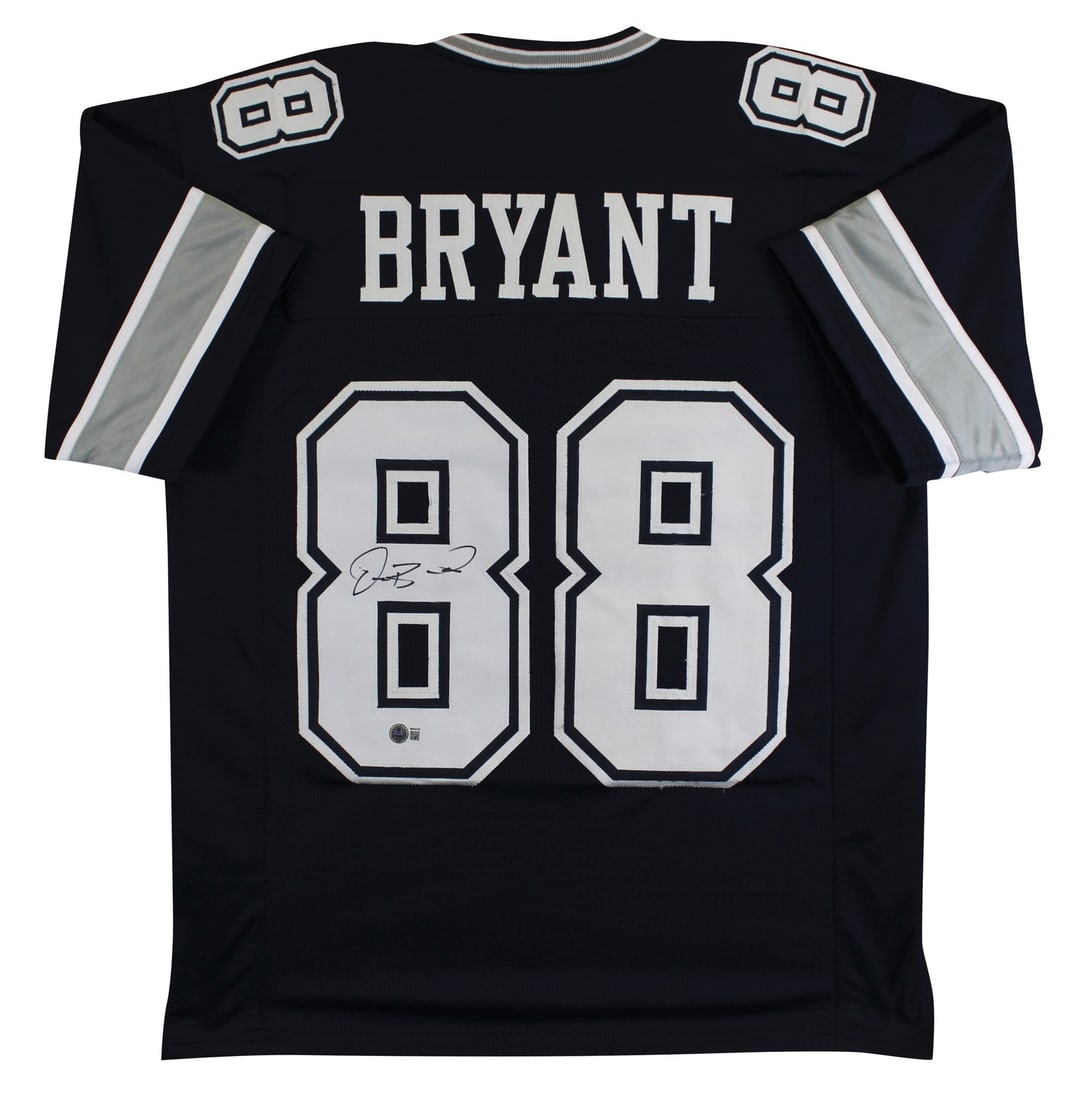Dez Bryant Signed Navy Custom Jersey Beckett BAS Witness Dallas Cowboys: Dez Bryant Signed Navy Custom Jersey Beckett BAS Witness Dallas Cowboys This Dez Bryant autographed navy pro style jersey is a custom-stitched, non-branded piece signed by the Dallas Cowboys player. T