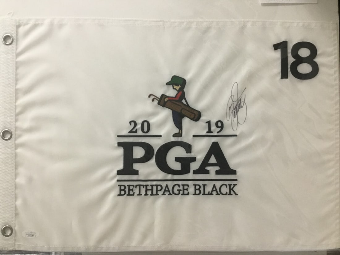 Rickie Fowler Signed 2019 PGA Bethpage Black #18 Pin Flag JSA AB13267: Rickie Fowler Signed 2019 PGA Bethpage Black #18 Pin Flag JSA AB13267 Celebrate the legacy of golf with this officially licensed 2019 PGA-Bethpage Black #18 pin flag, boldly signed by PGA star Rickie 