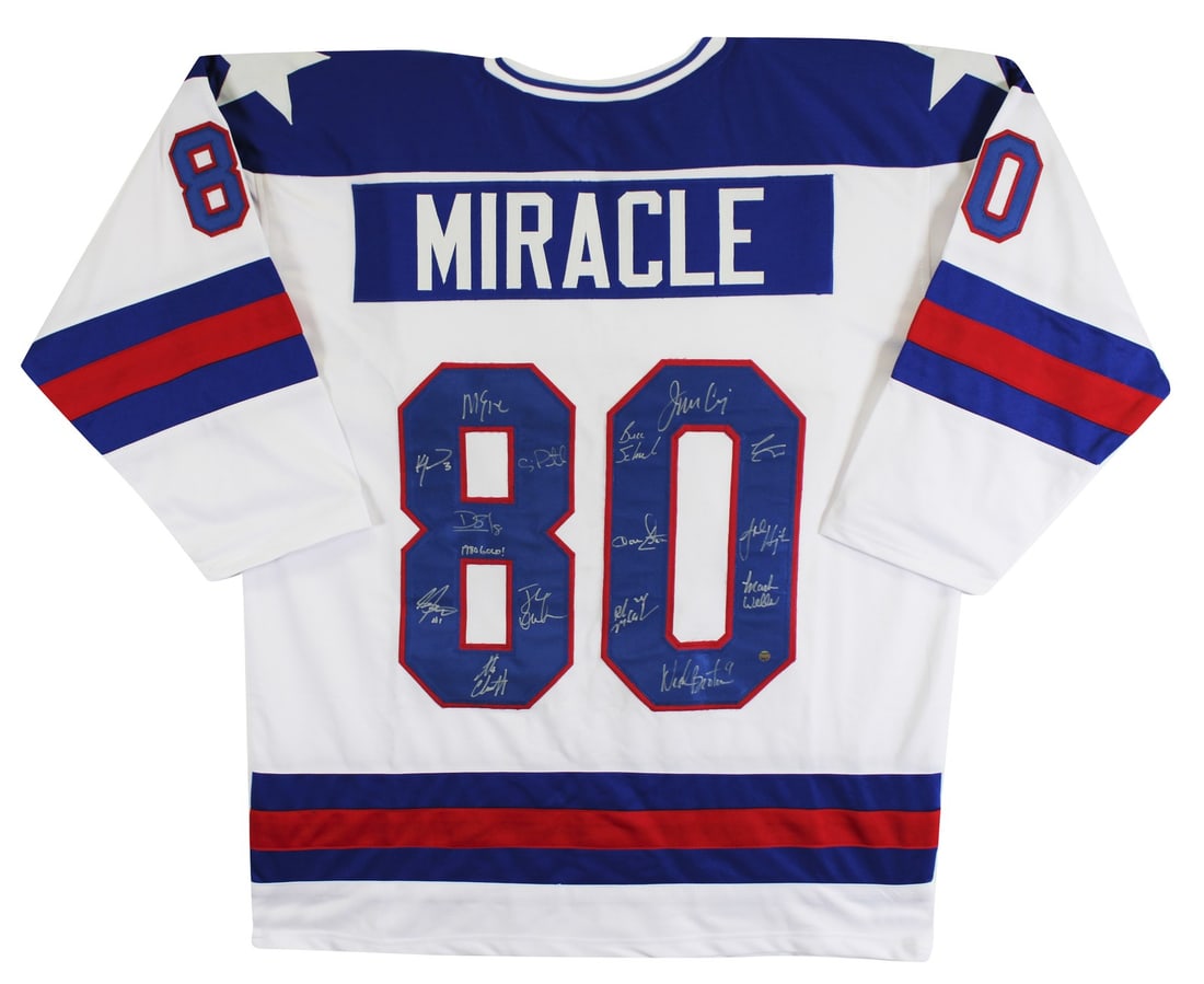 White Jersey Signed by 15 Members of 1980 USA Hockey Team Steiner COA: White Jersey Signed by 15 Members of 1980 USA Hockey Team Steiner COA This pre-owned white pro style jersey commemorates the 1980 USA Hockey team and features the signatures of 15 team members, includ