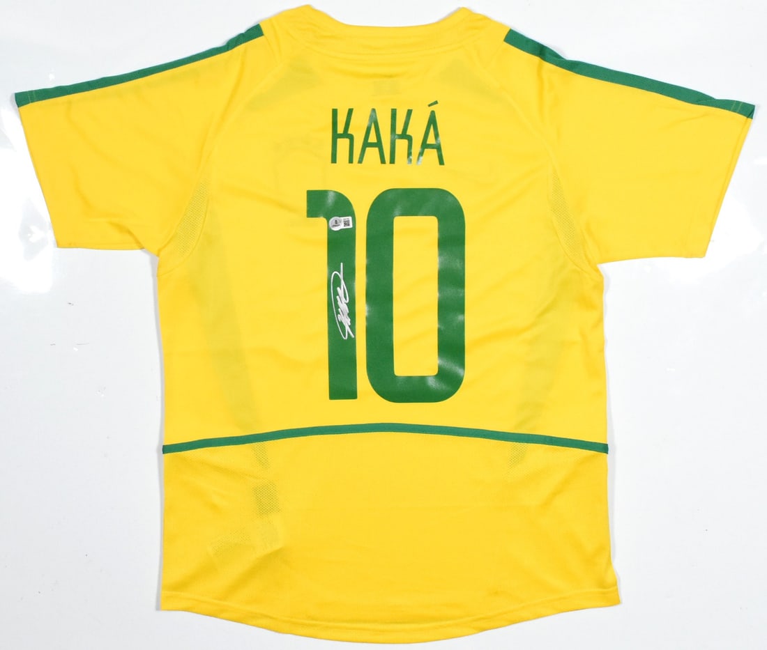 Brazil Home Soccer Jersey #10 Signed by Kaka Beckett Holo: Brazil Home Soccer Jersey #10 Signed by Kaka Beckett Holo Autographed Brazil home soccer jersey featuring #10. This pre-owned jersey is identified with a Beckett hologram. Specifications Item Type: So